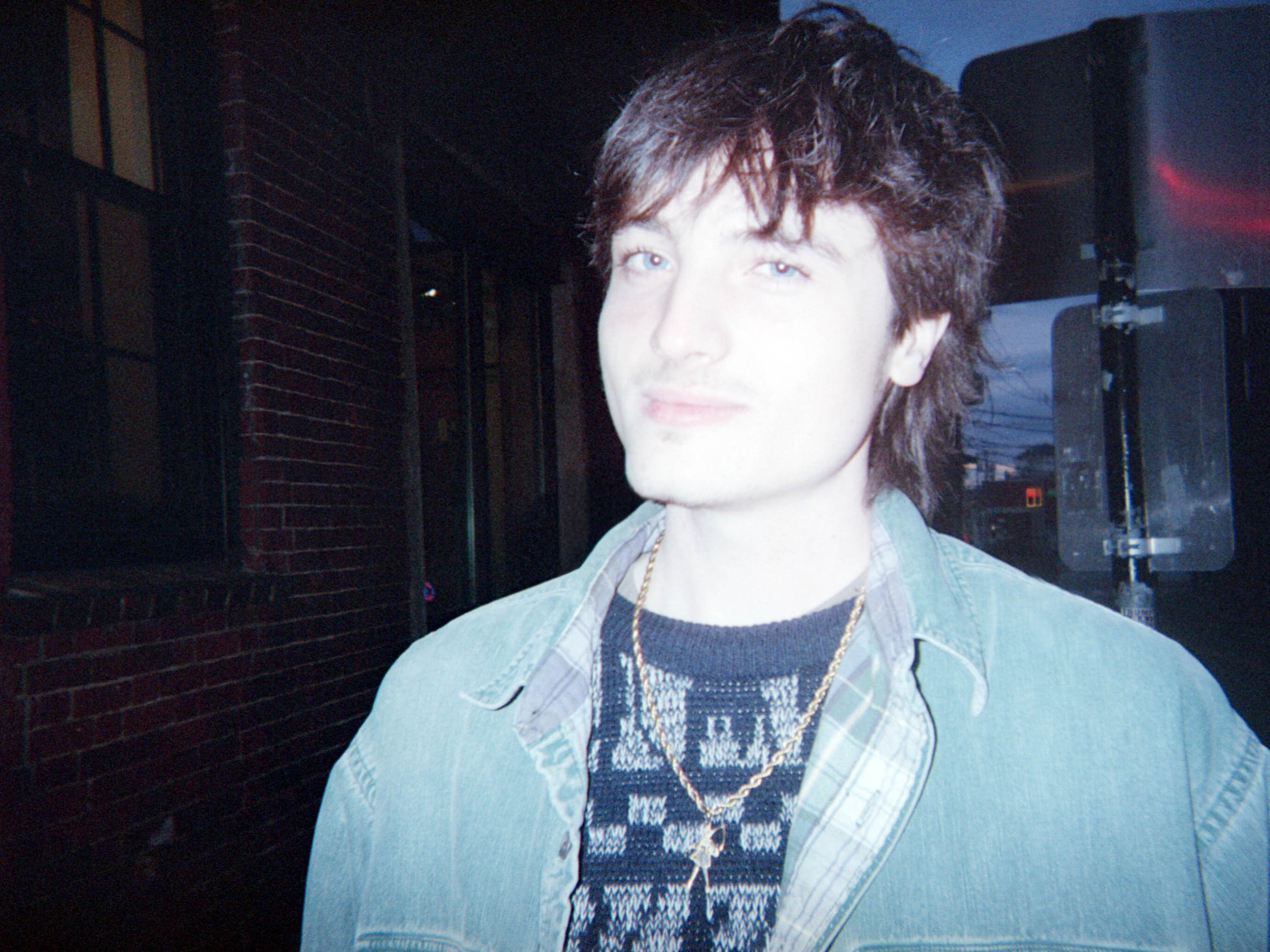 A flash-lit portrait outdoors